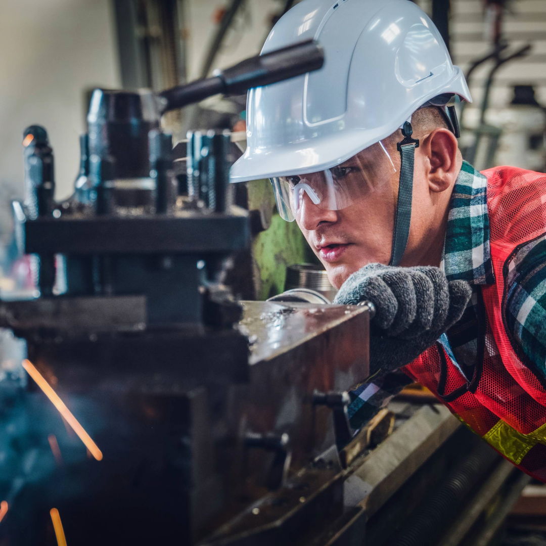 a man using metal fabrication machine 