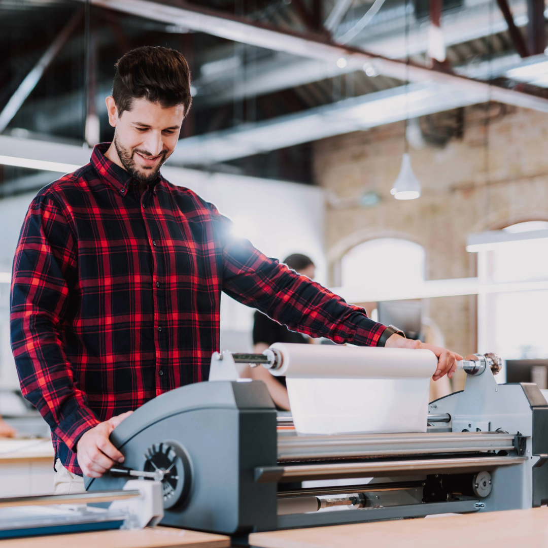 a man using a printing machine 