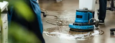 Person cleaning floor